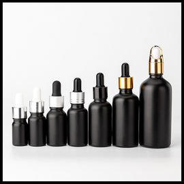 China Black Frosted Color Essential Oil Glass Bottles Cosmetic Packaging Round Shape supplier