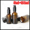 Brown Color Essential Oil Glass Dropper Bottle Black Pump For Cosmetic Lotion supplier